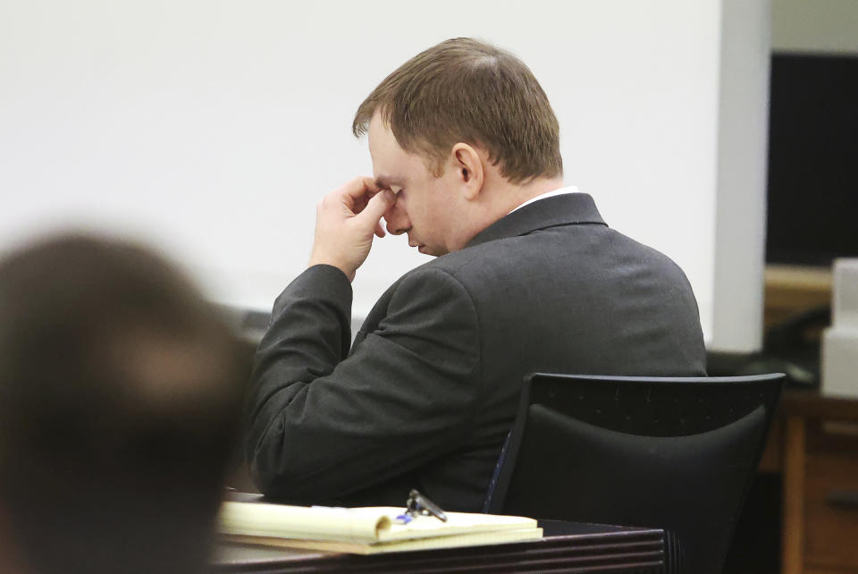 Aaron Dean reacts during the sentencing phase of his trial at Tarrant County's 396th District Court on Friday, Dec. 16, 2022, in Fort Worth, Texas. Dean, a former Fort Worth police officer, was found guilty of manslaughter in the 2019 shooting death of Atatiana Jefferson. (Amanda McCoy/Star-Telegram via AP, Pool)