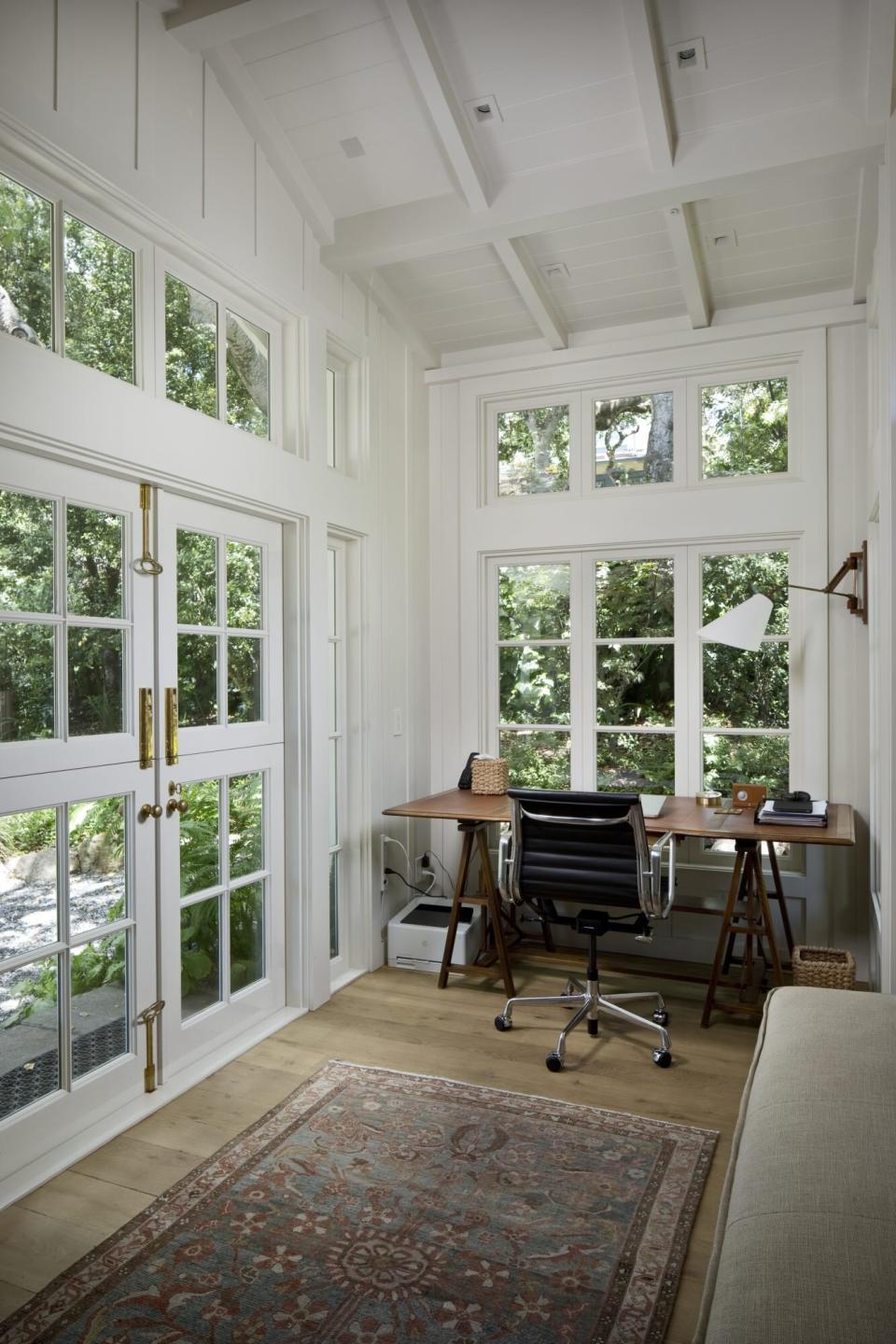 sunroom with a work from home desk