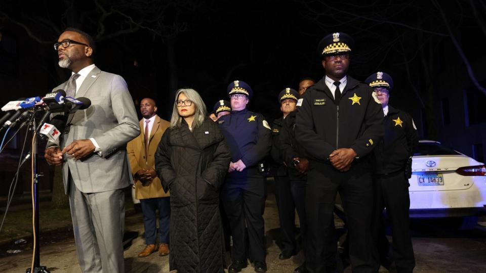 PHOTO: Mayor Brandon Johnson, left, addresses reporters as Chicago police Superintendent Larry Snelling, second from right, listens during a news briefing near the scene where teens were shot, one fatally, Jan. 31, 2024, in Chicago.  (John J. Kim/TNS/Newscom)