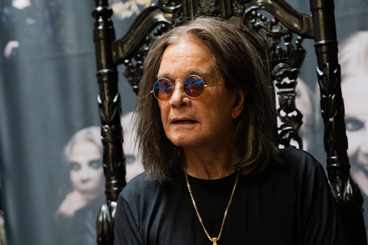 LONG BEACH, CALIFORNIA - SEPTEMBER 10: Musician Ozzy Osbourne signs copies of his album 