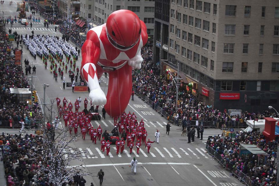 The Red Power Ranger float makes its way down 6th Ave during the Macy's Thanksgiving Day Parade in New York