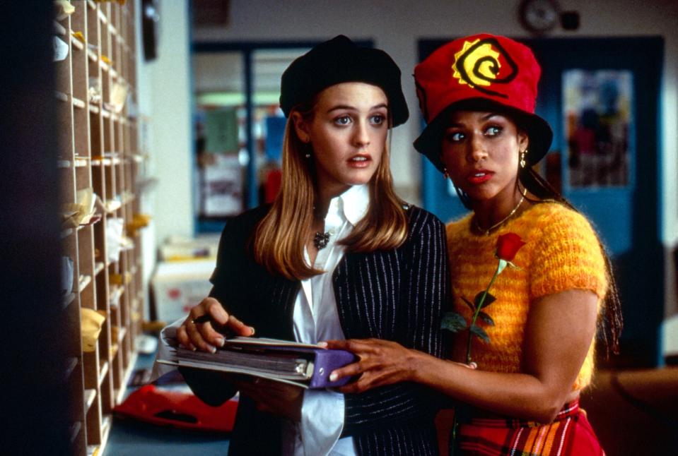 Cher and Dionne writing a secret love letter in the teacher's lounge