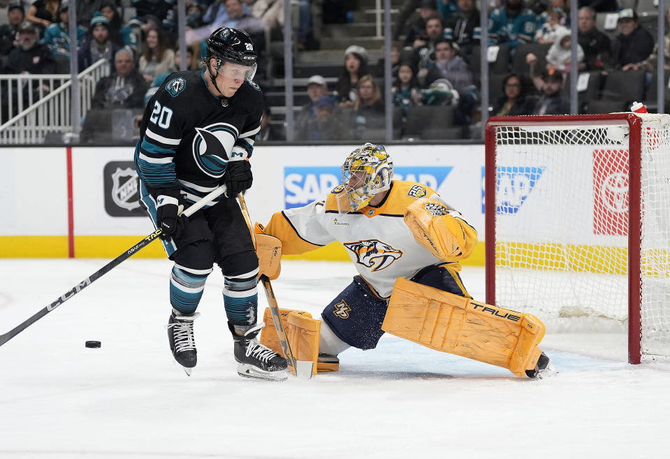 Nashville Predators goaltender Juuse Saros (74) blocks a shot by San Jose Sharks left wing Fabian Zetterlund (20) during the first period of an NHL hockey game Saturday, Feb. 24, 2024, in San Jose, Calif. (AP Photo/Tony Avelar)