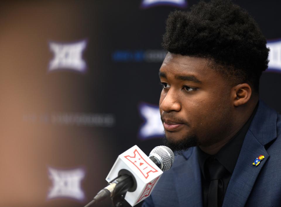 Kansas' Devin Neal speaks during the first day of the Big 12 football media days on July 13, 2022, at AT&T Stadium in Arlington, Texas.