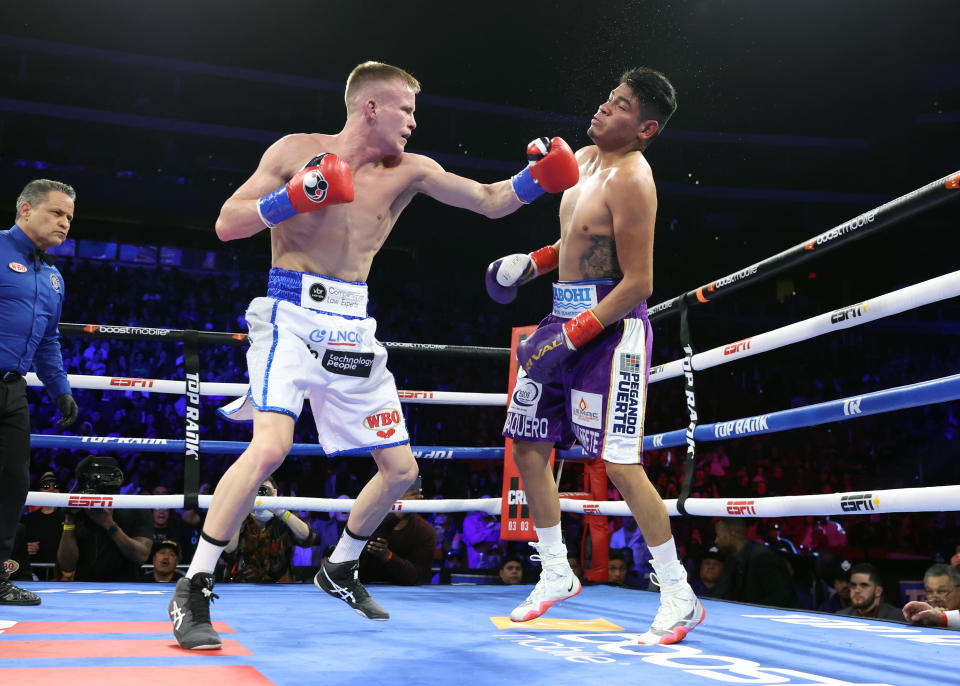 Liam Wilson and Emanuel Navarrete, pictured here in action during their WBO junior lightweight championship fight.