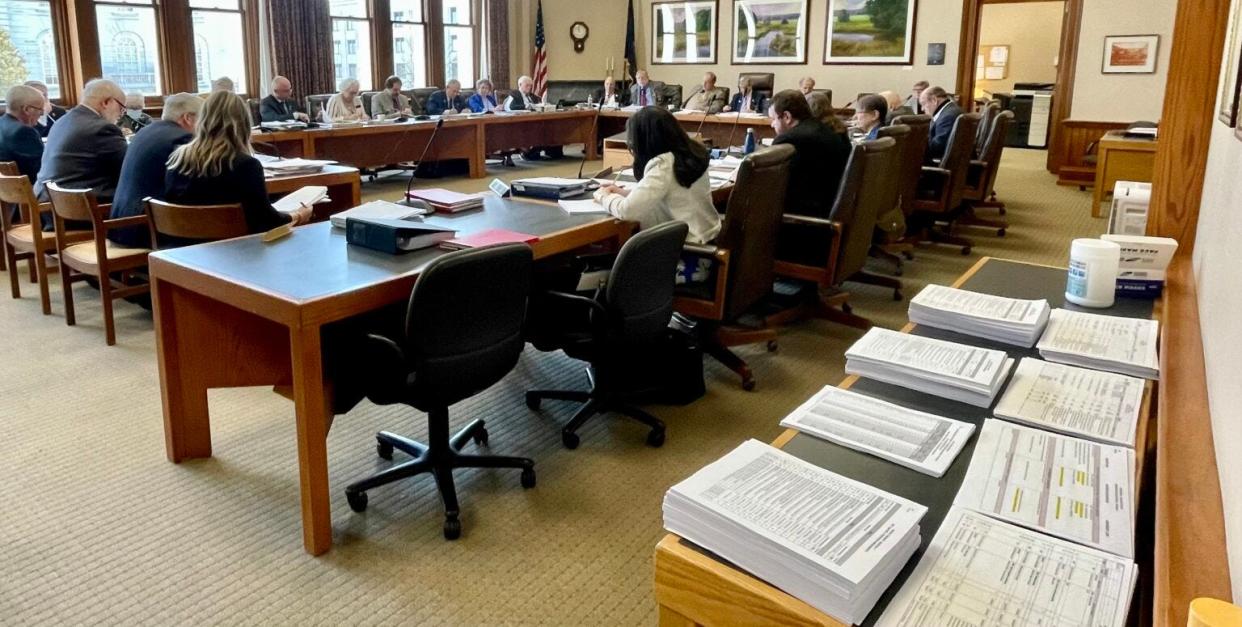 The House Finance Committee has less than two weeks to make its way through stacks of budget documents before taking a budget before the full House for a vote.