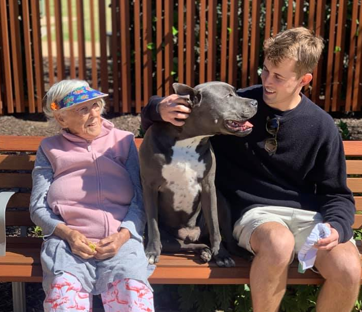 Sydney woman Val Hopper, who has dementia, with her grandson, Logan, and dog Polo.