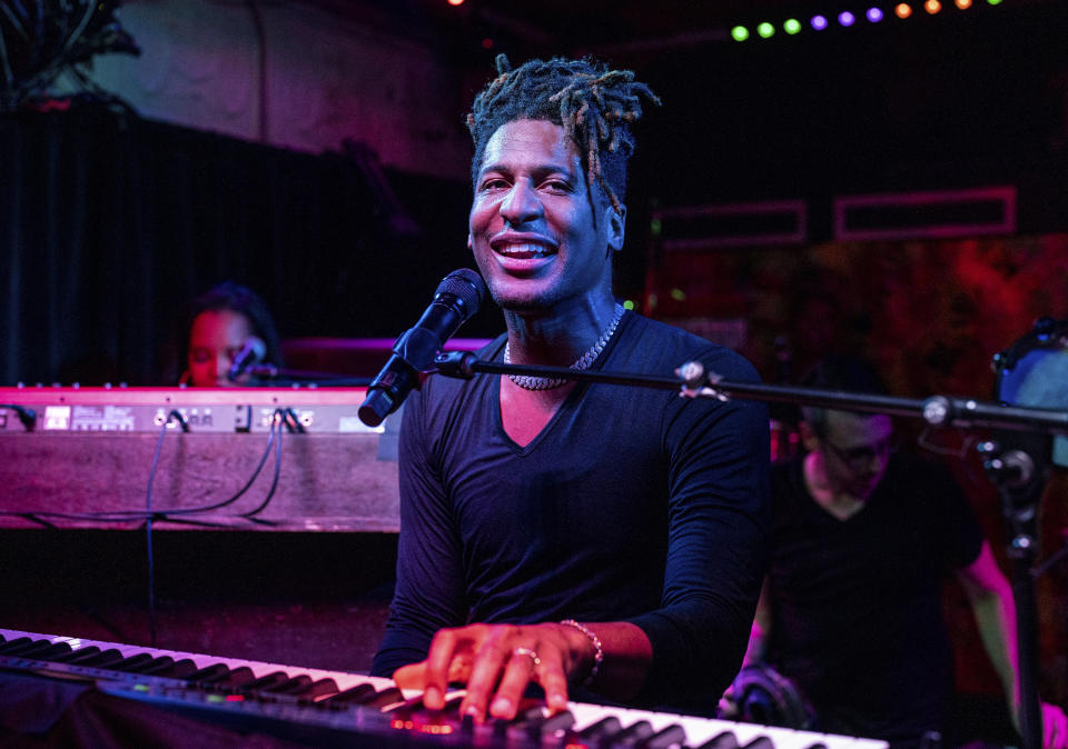 FILE - Jon Batiste performs at the Maple Leaf Bar in New Orleans on May 2, 2023. The singer-songwriter and multi-instrumentalist releases his latest album “World Music Radio” on Aug. 18. (Photo by Amy Harris/Invision/AP, File)