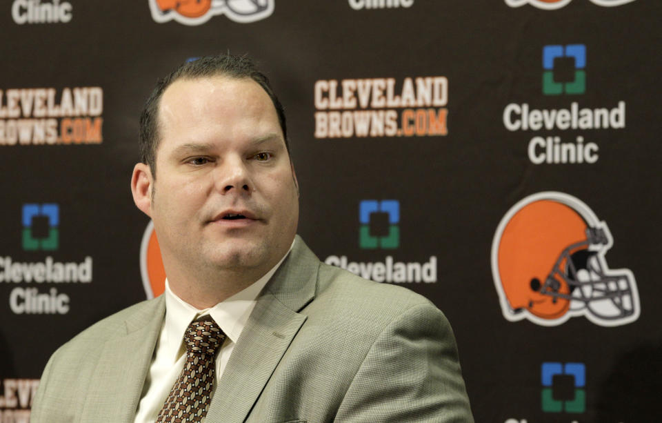 FILE - In this Jan. 14, 2011, file photo, Cleveland Browns general manager Tom Heckert speaks at a news conference in Berea, Ohio. The Broncos say former personnel executive Tom Heckert died Sunday night, Aug. 5, 2018, following a long illness. Heckert, 51, stepped away from the Broncos after last season after being diagnosed in recent years with amyloidosis, a rare disease that causes a buildup of amyloid proteins in the heart, kidney, liver and other organs. (AP Photo/Amy Sancetta, File)