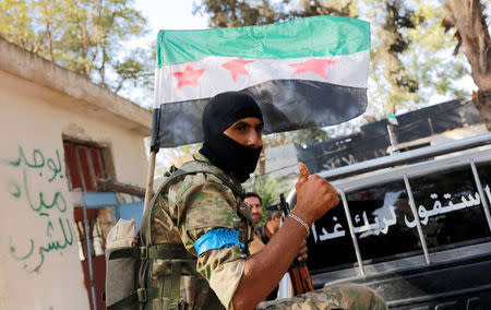 A member of Turkish-backed Free Syrian Army (FSA) is pictured in the border town of Jarablus, Syria, August 31, 2016. REUTERS/Umit Bektas