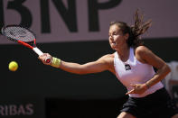 Russia's Daria Kasatkina returns the ball to Italy's Camilla Giorgi during their fourth round match of the French Open tennis tournament at the Roland Garros stadium Monday, May 30, 2022 in Paris. (AP Photo/Michel Euler)