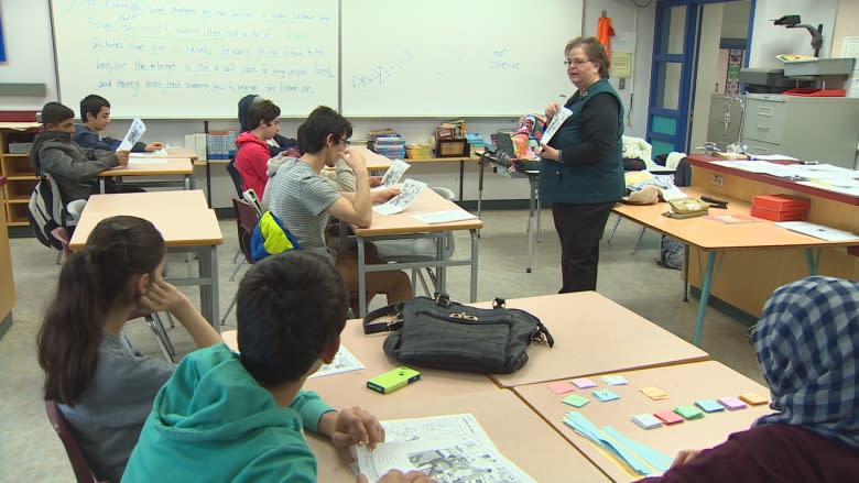 Retired B.C. teacher back in classroom helping refugee teens