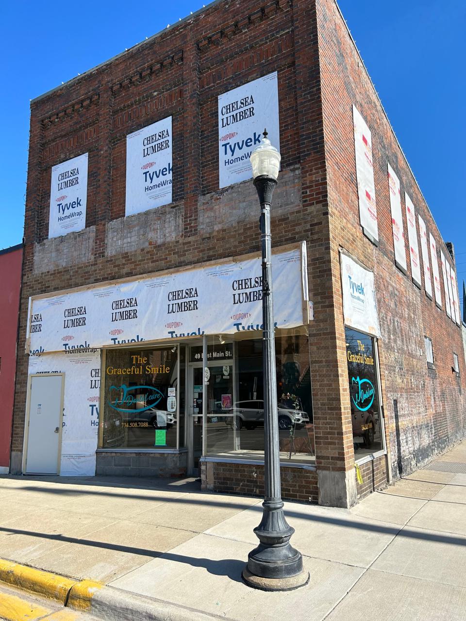 State funding is supporting work at 49 E. Main St. that will restore the historic facade of the building, make interior improvements and create two new residential units.