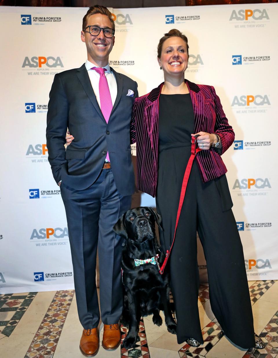 Downes and Kensky pose for photos with Rescue at the ASPCA Humane Awards in New York City in November. (Photo: David L. Ryan / Boston Globe via Getty Images)