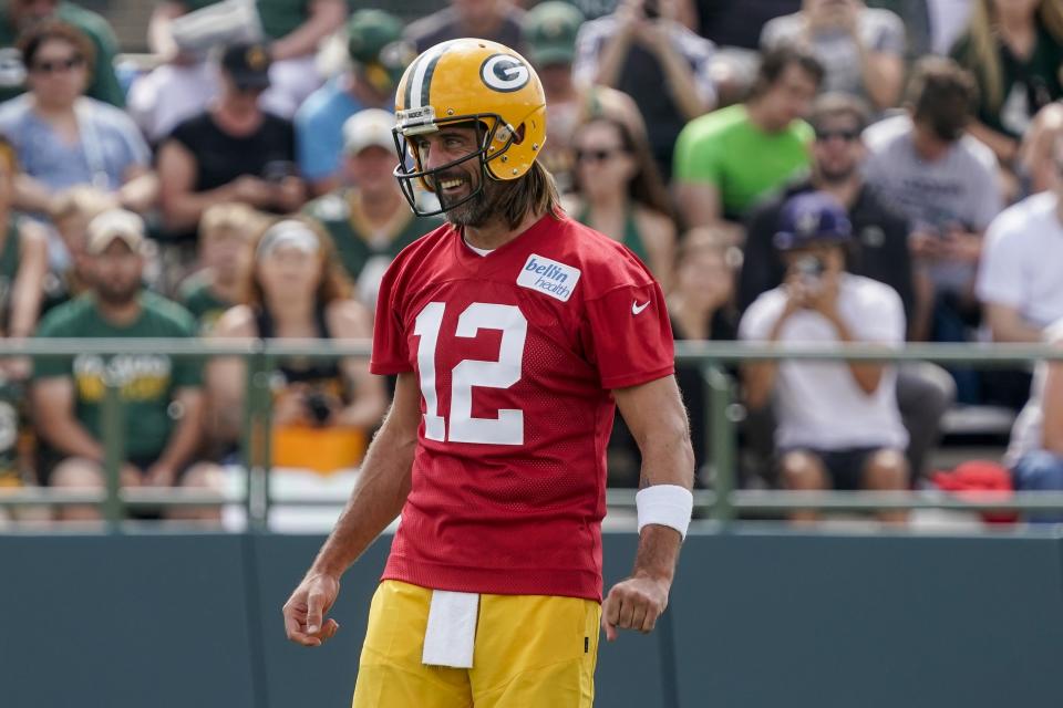 Green Bay Packers' Aaron Rodgers watches a drill at the NFL football team's practice field Wednesday, July 27, 2022, in Green Bay, Wis. (AP Photo/Morry Gash)