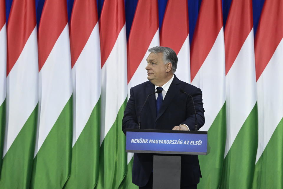 Hungary's Prime Minister Viktor Orban delivers his annual "State of Hungary" speech in Budapest, Hungary, Saturday, Feb. 17, 2024. The message on lectern reads: "For us Hungary is the first!" (Szilard Koszticsak/MTI via AP)