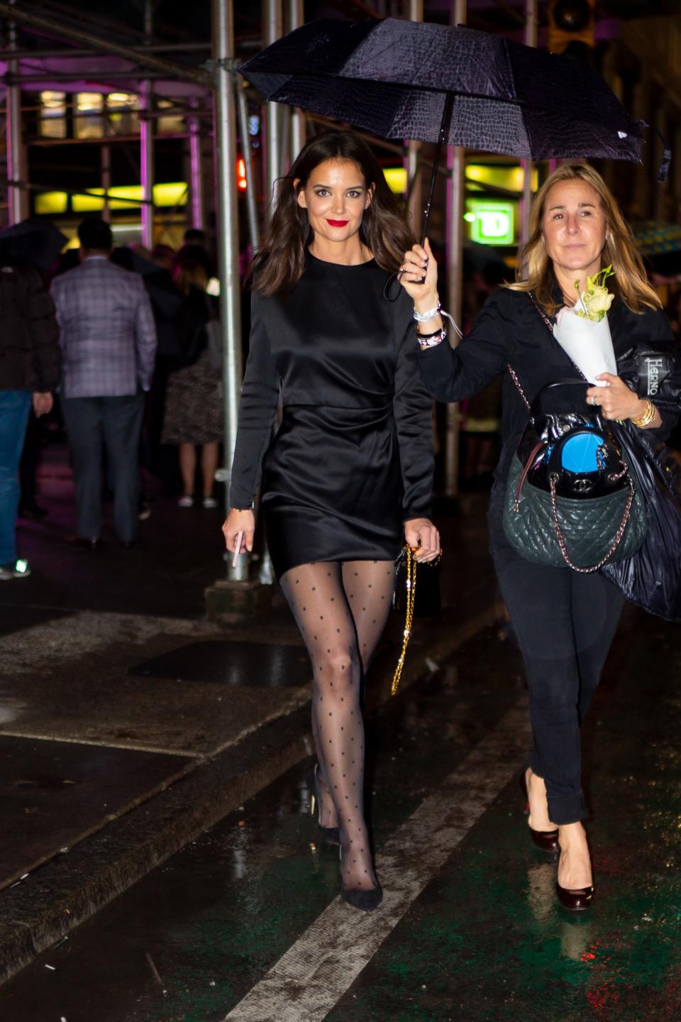 Holmes in New York City in a Saint Laurent dress on October 22, 2019.