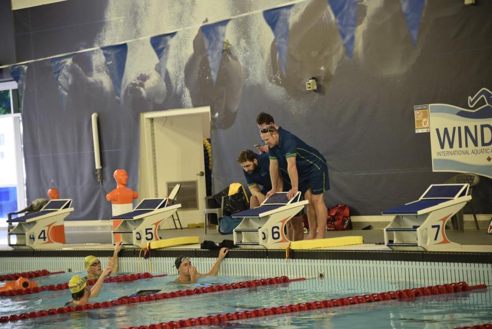 Members of the Australian national lifesaving sport team take direction from their coach while practicing at the Windsor International Aquatic Centre on Tuesday, Sept. 13, 2023. The Commonwealth Lifesaving Games are held from Sept. 14 to 17, 2023 in Windsor. 