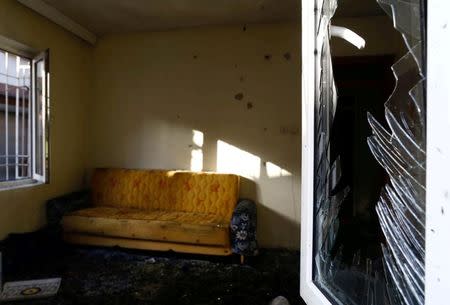 A damaged house is seen after a suspected suicide bomber targeted a wedding celebration in the Turkish city of Gaziantep, Turkey, August 21, 2016. REUTERS/Osman Orsal