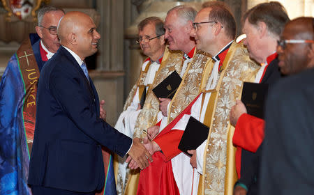 Britain's Home Secretary Sajid Javid arrives at a Service of Thanksgiving to mark the 70th anniversary of the landing of the Windrush, at Westminster Abbey, London, Britain, June 22, 2018. Niklas Halle'n/Pool via REUTERS