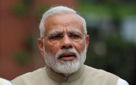 FILES PHOTO: Prime Minister Narendra Modi arrives to cast his vote for the country's next President, at the Parliament House in New Delhi