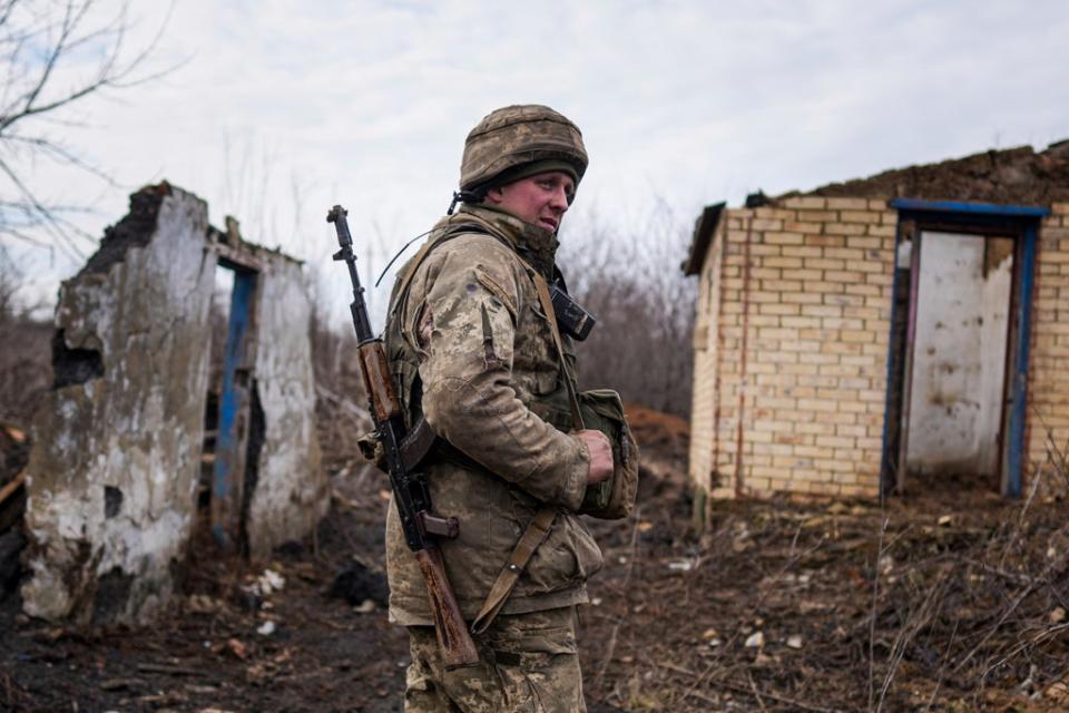 Boris Johnson is leading a crisis meeting of senior ministers and officials to consider how to respond to Vladimir Putin’s military action against Ukraine (Evgeniy Maloletka/AP) (AP)