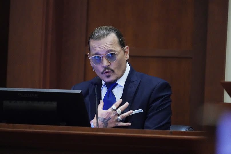 Johnny Depp testifies in the courtroom at the Fairfax County Circuit Courthouse in Fairfax, Va., Monday, April 25, 2022.