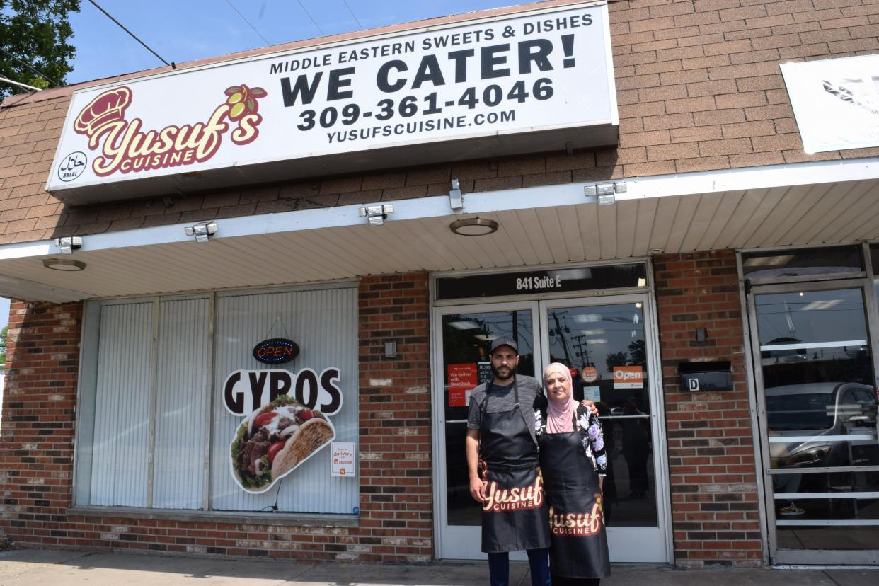 Co-owners Mohammed Zeid and Samira Zeid stand outside of Yusuf's Cuisine on June 22, 2023. The restaurant opened for dining in early May.