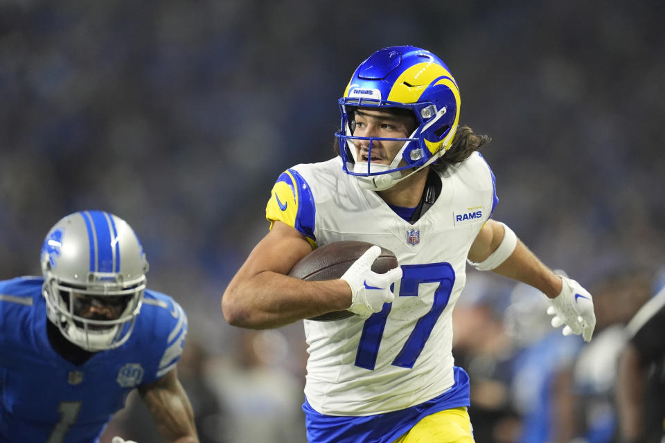 Los Angeles Rams wide receiver Puka Nacua runs towards the endzone for a touchdown during the first half of an NFL wild-card playoff football game against the Detroit Lions, Sunday, Jan. 14, 2024, in Detroit. (AP Photo/Paul Sancya)