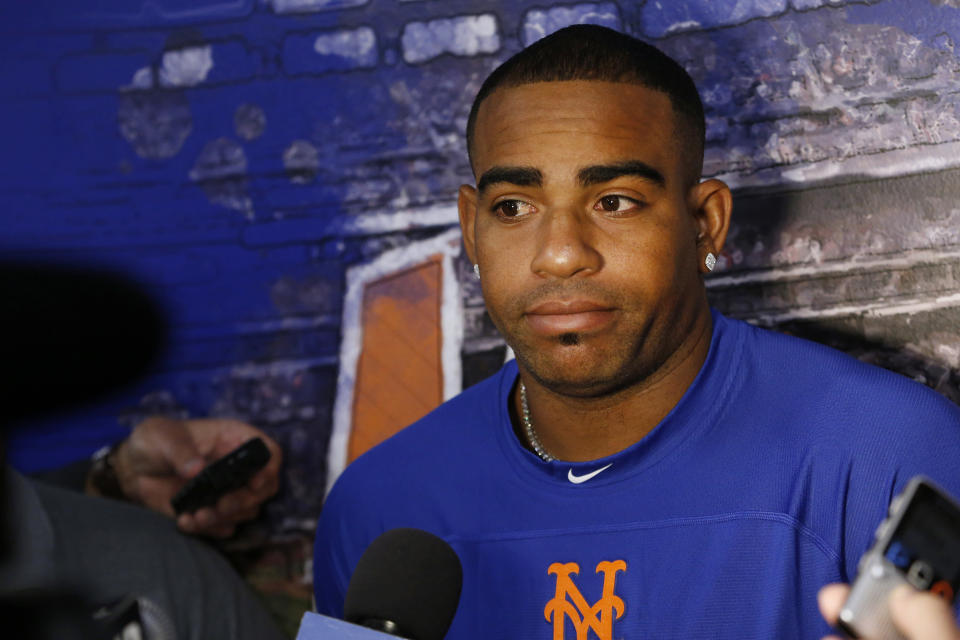 New York Mets' Yoenis Cespedes holds a news conference before a baseball game between the Mets and the Miami Marlins, Sunday, Sept. 30, 2018, in New York. (AP Photo/Jason DeCrow)