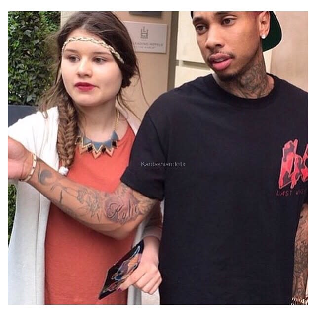 Tyga has added even more fuel to the rumors that he's dating 17-year-old Kylie Jenner. The 25-year-old rapper allegedly got a large tattoo of the reality star's name inked across his inner arm, leading many to believe that these two are more than just friends. After all, Tyga doesn't have his buddy Chris Brown's name inked on his arm. <strong>VIDEO: Tyga Addresses Kylie Jenner Dating Rumors and Drake Feud </strong> In a photo posted to Instagram on Sunday, the new tat can be seen clearly on the rapper's arm, though some have suggested the picture could have been fabricated. However, in a selfie the rapper posted on Friday, a bit of the possible ink is visible, but is still too obscured. At the beginning of April, Tyga responded, in a way, to rumors that he was dating Kylie, telling ET, "We're friends and that's all I really want to talk about right now." <strong>PHOTOS: They Dated?! Surprising Celebrity Hookups </strong> However, Tyga's been a lot more talkative on Instagram, often posting photos of Kylie with captions that many have interpreted as romantic. For more from Tyga on the Kylie Jenner romance rumors check out the video below.