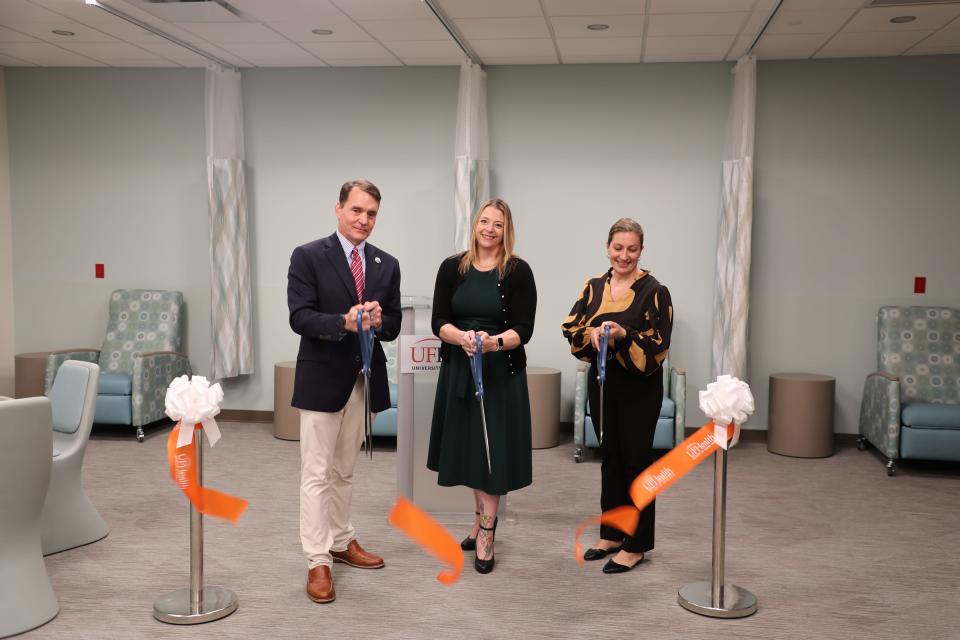 UF Health St. Johns President and CEO Carlton DeVooght, from left, UF Health Behavioral Health Resource Center Director Valerie Duquette and Vice President of Nursing Michelle Paulo cut the ribbon at the hospital's newly expanded Behavioral Health Resource Center.