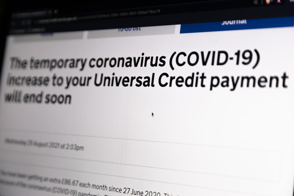 In this photo illustration, a laptop screen shows a notice to a benefits recipient that the temporary coronavirus (COVID-19) increase to their Universal Credit payment will be removed by the end of September on 5th September, 2021 in Leeds, United Kingdom. British Chancellor Rishi Sunak is set to remove the £20 a week uplift to Universal Credit recipients in a move that critics have said will force the country's poorest further into poverty. (photo by Daniel Harvey Gonzalez/In Pictures via Getty Images)