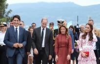 Prime Minister Justin Trudeau, left to right, the Duke of Cambridge, Sophie Gregoire Trudeau, and the Duchess of Cambridge take a walk at the Kitsilano Coast Guard station, in Vancouver on Sunday, Sept. 25, 2016. THE CANADIAN PRESS/Jonathan Hayward