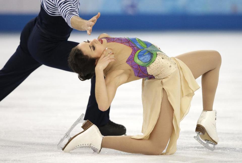 Sara Hurtado and Adria Diaz of Spain compete in the ice dance free dance figure skating finals at the Iceberg Skating Palace during the 2014 Winter Olympics, Monday, Feb. 17, 2014, in Sochi, Russia. (AP Photo/Darron Cummings)