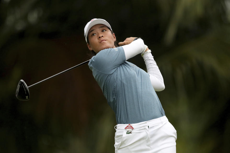 Celine Boutier of France plays a shot from the second tee during her final round at the Women's World Championship golf tournament at Sentosa Golf Club in Singapore, Sunday, March 6, 2022. (AP Photo/Paul Miller)