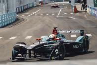 (Bloomberg) -- If you want to know what your car might be like in 2030, and which brands—automotive or otherwise—may be the ones to make it, go watch a Formula E race.The single-seater racing series, now in its fifth season, is like Formula 1—with open-cockpit cars powered by electricity, rather than gas. The next E-Prix will take place on July 13 and 14 in Red Hook in Brooklyn, N.Y. It’s the site of the final two races of the season and the only one this year set in U.S. shores.And it’s a big deal. Audi, BWM, Mercedes-Benz, Mahindra, NIO, Nissan, Virgin, Jaguar, and Porsche are all multimillions-of-dollars-deep into developing their involvement; Nico Rosberg, Qualcomm, and Discovery are investors. They see the racing series as a critical testing ground for technologies on tap for the transportation devices of the future. And such brands as Hugo Boss, Bremont, and Tag Heuer, among others, are hosting parties, conferences, and drive events for press and VIPs throughout the week preceding the races; Harley Davidson is using it as an opportunity to unveil its first-ever electric motorcycle, Project Livewire, to selected media for first-ride reviews.Indeed, Formula E is a celebration of the future of electric autos. It provides stark relief between those companies that can make a viable electric motor and those that can’t. Whereas F1 technologies are so proprietary and secretive that fans need they need a university degree to wade through the distinctions, Formula E teams use the same battery with the same amount of energy; the team that designs the most efficient motor is very likely to win. (That’s with no small effort from one of the welterweight-fit race car drivers, of course.)The stakes are high, if still speculative. Today, battery-powered vehicles account for 1.2% of automotive sales worldwide, but by 2025 their number is expected jump to nearly 11 million vehicles sold, 10 times what it is today. The key for automakers in the meantime is to convince consumers that electric cars are reliable and durable enough to withstand daily, crushing, enthusiastic, and even monotonous use.Tickets to the 2019 New York City E-Prix can be had cheap, at $12. Without the ear-drum-blowing, dangerous decibels of a F1 race, the races presents a family-friendly opportunity to see at thrilling proximity how an emerging sport is gathering speed. (No pun intended.)Plus, while you’re there, you can explore one of New York’s most exciting, fast-developing neighborhoods. (Plus the largest Ikea, complete with Swedish meatballs, you’ve probably ever seen.) Here are our best recommendations for where to eat, drink, and watch during the Formula E races, and even sleep the night before. Where to EatHometown Bar B QueSouthern-style brisket, pork, lamb, and turkey, pit-smoked to pair with traditional sides and craft beers. 454 Van Brunt St.Fort DefianceNeighborhood farm-to-table cooking includes summer squash risotto, Berkshire pork chop, and pan-roasted branzino. Fort Defiance has a full cocktail and oyster bar as well. 365 Van Brunt St.Steve’s Authentic Key Lime PiePies and tarts made by hand from fresh-squeezed lime juice for more than 30 years. The citrus-averse will find a few chocolate concoctions there, too. 185 Van Dyke St.Pizza MotoBrick-oven New York-style pizza, from classics such as Margherita and Pepperoni to Jerzy Pork Store and Vermonter. 338 Hamilton Ave.Grindhaus Local eclectic fare such as Southern-rub roasted chicken, chilled pea soup, and twice-fried chicken wings, plus a full bar. 275 Van Brunt St.Red Hook Lobster PoundSourcing live Maine lobster for six different types of lobster rolls, plus fish ’n’ chips, hot crab dip, and a succulent shareable lobster for two, among other crowd favorites. 284 Van Brunt St. Where to Sleep1 Hotel BrooklynSet on Pier 1 of Brooklyn Bridge Park, with stunning views of the Manhattan skyline, a full restaurant, and multiple bars. The rooms incorporate reclaimed woods, industrial steel, and custom organic-cotton elements by Keetsa. 60 Furman St., Brooklyn HeightsThe William ValeAt Williamsburg’s newest hotel, with a stunning roof deck and pool, sunset drinks are a must. All of the slick, minimal rooms have floor-to-ceiling windows and deck balconies. The ground floor Southern Italian-style restaurant is operated by chef Andrew Carmellini of the Dutch, Locanda Verde, and Bar Primi. 111 N. 12th St., WilliamsburgThe Ludlow HotelAn option in Manhattan’s Lower East Side that’s close enough to be accessible to Red Hook while you keep a foot in the center of it all. Slightly more undercover than its Bowery Hotel sister property, with studios, terraces, lofts, and a penthouse on offer. Its restaurant, Dirty French, is a perpetual scene. 180 Ludlow St., Manhattan Where to DrinkDive BarsSunny’s Red HookDefinitive Brooklyn dive; you’ll know it by the old truck parked out front. 253 Conover St.Brooklyn Ice HouseCasual, outdoor seating with simple burgers to match the PBR and onion rings. 318 Van Brunt St.Van Brunt Still HouseA small-batch distillery with a roughed-up, cool tasting room and selections such as spicy rye whiskey, smoky corn whiskey, and smooth wheated bourbon. 6 Bay St.Cocktails With a ViewThe William ValeHead to the rooftop for Instagram-worthy cocktails at sunset. 111 N. 12th St., Williamsburg1 Hotel BrooklynThe best hotel views of Manhattan while closest to the race course. 60 Furman St., Brooklyn HeightsBrooklyn CrabAround the corner from Sunny’s. If you stretch, you can see the Statue of Liberty from the roof deck—and play lawn games, while you’re at it. 24 Reed St.Ceconis x Dumbo HouseSoho House’s Brooklyn location offers Old-Fashioned cocktails and water views on the East River. 55 Water St. Formula E Rules to KnowFormula E is like Formula One but with cars powered by electric batteries, rather than conventional engines. This season, 22 drivers from 11 teams are racing to win the top spot by the end of the series, which has taken them to such locales as Santiago, Hong Kong, Paris, Monaco, Rome, and Marrakesh, Morocco.The official ABB FIA Formula E Championship includes two separate titles, one for the winning driver and one for the winning team. The driver championship goes to whoever earns the most points over the eight-month season. The team championship goes to the team with the highest combined scores of its two drivers over the season. This season, Frenchman Jean-Éric Vergne is currently in first place among the drivers, and China’s DS Techeetah leads the team rankings.Drivers earn points by finishing well in each race, with 25 points awarded to the race winner, 18 points to the runner-up, 15 points for a third-place finish, and so forth. Tenth place earns one point, after which no points are awarded. The driver who is at pole position earns an additional three points, while the driver who sets the fastest lap and finishes in the top 10 gets an additional one.The drivers have two ways to get more power for their cars during a race—and these launch it squarely into live-action video game territory, unlike the analog Formula One. The first one is called Attack Mode. To do this, drivers leave the racing line and drive through a slower lane in the “activation zone.” If they do this, they get an extra 25 kW of power unlocked on the powertrain, which they can use to help them speed through the next few laps. Or they can win the “Fan Boost” power surge, which is determined by fan voting. This awards the driver a 25 kW power boost during a five-second window in the second half of a race. Fans can vote for favorite drivers online or live on Twitter by using the hashtag of the name of their chosen driver along with FANBOOST.It is forbidden to use more than four new rear and four new front tires during each racing weekend, from shakedown through the end of the race. If for some reason, a team burns through its allotted supply of tires, it’s out of the race. All teams must use special, bespoke, 18-inch, all-weather Michelin tires.No charging of any car is allowed during qualifying rounds and the E-Prix, but teams can charge their cars between sessions and during practice. Cars are charged on generators powered by glycerine, a zero-emission bio-diesel byproduct; it takes one hour to fully charge. Only one car is used per driver per race. The Race ScheduleFridays are typically for shakedowns, when drivers and teams get to know the track and evaluate the technology and mechanics of their cars.Each race weekend involves practice sessions—one 45 minutes long and one 30 minutes long—on the first track day, as well as one on the second track day. The time keepers are engaged during the practice sessions, but the results don’t count toward final standings.Qualifying rounds happen before each day’s main events on Saturday and Sunday. They determine the order in which each driver will start the race. They’re run in groups of up to six cars, so there’s a little more room to maneuver on the track. Each group posts its fastest lap, and the fastest six times go on to compete in a “super pole” shootout wherein drivers compete one-by-one for pole position. The driver with the fastest qualifying time gets the first-place start, and the driver with the slowest time starts at the back. Qualifying sessions last one hour.The race itself is called the “E-Prix.” It lasts 45 minutes, plus one lap. Once the leader has crossed the finish line after 45 minutes of racing, everyone does one more lap before the race is officially over. The CarThis season will see new cars racing around 12 cities. (Previous model cars are now on sale to collectors.) The 2019 car has a battery with capacity nearly double that of its predecessor; it will debut in New York with 250 kW of power (equal to 335 bhp) and can accelerate from zero to 62 mph in 2.8 seconds. Top speed is 280 kilometers per hour (174 mph).The minimum weight of the car and driver together is 900 kilograms (1,984 pounds). (The battery alone weighs 385 kg, or 849 pounds.) Each car is 5,160 millimeters long and 1,770 mm wide, or about 17 feet long and nearly six feet wide.The halo ring around the top of the cockpit on the new cars is there for protection in the event of a crash. It also has an LED strip that flashes blue, when the driver is in Attack Mode, and magenta, when a driver is using Fanboost. The CourseThe 1.5-mile track runs along the historic Brooklyn Cruise Terminal, deep in Brooklyn’s Red Hook section. Because of its 14 corners, it is considered the toughest in the series for all 22 cars and drivers. There will be grandstands, paddocks, entertainment areas, and VIP lounges for ticket holders and attendees.The CrashesInevitably, cars will collide. Usually, the impact isn’t severe; as the old saying goes, if you’re not rubbing, you’re not racing. But when bad collisions happen, the halo ring that sits above the cockpit will protects drivers from the force of 14 cars stacked on top of their vehicle. Here is a compilation of the most dramatic crashes of the season so far. Drivers to WatchJean-Éric VergneThe Frenchman won last year’s championship, clinching the title after the New York E-Prix in 2018. Vergne competed in Formula One for Scuderia Toro Rosso from 2012 to 2014 and was a Ferrari test and development driver from 2015 to 2016. In the standings this year driving for Techeetah, he is currently in first place.Lucas Di Grassi The Brazilian racer drives for Audi’s Formula E team. He won the Formula E championship title in the 2016/2017 season; this year he’s currently in second place.Mitch Evans The Kiwi won his first-ever Formula E race in Rome this year, driving for Panasonic Jaguar Racing. He’s currently in third place.André LottererThe German racer is the second driver for Techeetah, currently in fourth place and helping boost the team to an all-around top post so far in the series. He is famous for his three wins at the 24 Hours of Le Mans, driving for Audi, and for winning the World Endurance championship in 2012. Teams to WatchDS TecheetahThe Chinese motor racing team is currently leading the team standings under team principal Mark Preston. Its two drivers hold the first and fourth positions going into July’s races.Audi Sport ABT Schaeffler Germany’s Audi Sport ABT Schaeffler was one of the founding members of the Formula E racing series. The team principal is Allan McNish, who has led the team to its current second-place standing.Envision Virgin Racing The British racing team is majority-owned by Envision Energy, with Sylvain Filippi as principal. A founding member of the Formula E series, it currently sits in third place in the overall standings.BMW i Andretti MotorsportAt No. 6, BMW i Andretti racing is the top-ranked team with a U.S. affiliation. It sits in the Andretti Autosport conglomerate owned and operated by former driving champion Michael Andretti. How to Get ThereBy Shuttle — Free shuttles to the track leave from Carroll Gardens and from the Atlantic Terminal near Barclays Center every half hour.By Subway — The Carroll Street Station stop on the F Line is a 15-minute walk to the track.By Car — Street parking will be a challenge, so plan to park in an outdoor lot, pay with cash, and walk to the event. Better yet, go by taxi or car service.By Citi Bike — You can pick them up all over Brooklyn and in Manhattan’s Lower East Side. If you get one in Manhattan, ride over the Brooklyn Bridge for beautiful views. Allow an hour or so for the ride, but remember to dock the bike/re-check it out every 30 minutes, or risk a fee. Don’t Forget to BringTickets — Prices start at $12 and reach $390 for two-day lounge passes.Sunscreen — There will be indoor lounges and covered areas and seating, but the grandstand seats lie under direct sunlight. Plan ahead to protect your skin.Ear Plugs — Formula E has nowhere near the sound level of Formula 1, which can reach 140 decibels during a race. But at a top level of 80 decibels, Formula E still merits some ear protection.To contact the author of this story: Hannah Elliott in New York at helliott8@bloomberg.netTo contact the editor responsible for this story: Justin Ocean at jocean1@bloomberg.netFor more articles like this, please visit us at bloomberg.com©2019 Bloomberg L.P.