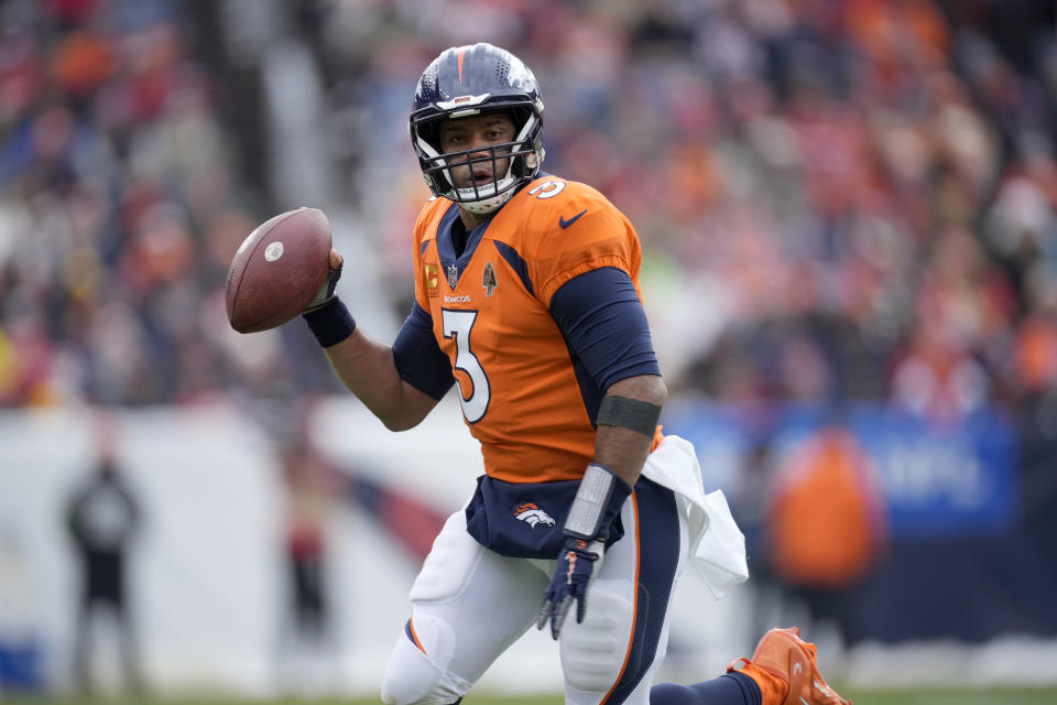 Denver Broncos quarterback Russell Wilson drops back to pass during the first half of an NFL football game against the Kansas City Chiefs Sunday, Oct. 29, 2023, in Denver. (AP Photo/David Zalubowski)