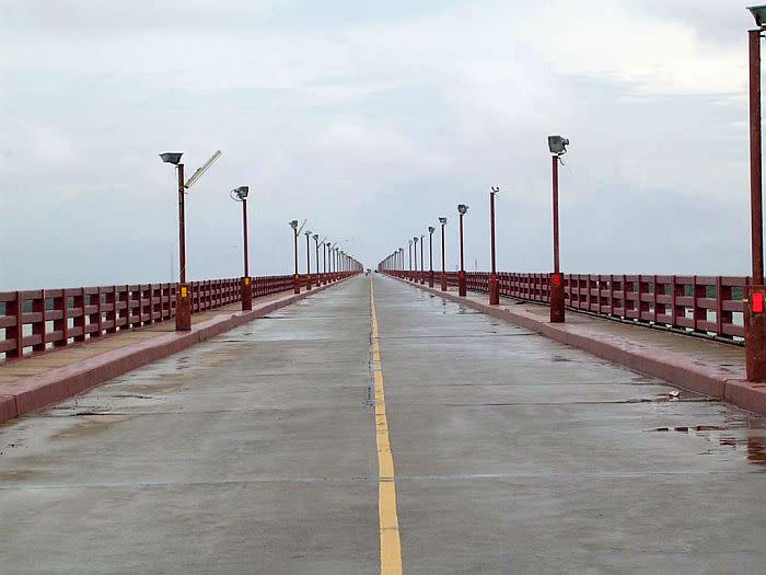 A view from the centre of Pamban bridge. I was fortunate to get this shot without any vehicular traffic.<br><br><b>ABOUT THE PHOTOGRAPHER: </b><br><b>J MADHU RANTHAKAN</b> is a software professional and a hobbyist photographer interested in sculptures and heritage temple architecture. He also loves photographing nature and children. He is a native of Pollachi in Coimbatore district of Tamil Nadu.