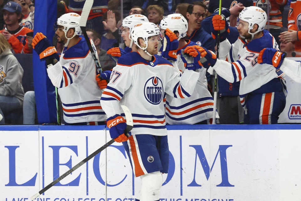 Edmonton Oilers left wing Warren Foegele (37) celebrates his goal during the first period of an NHL hockey game against the Buffalo Sabres, Saturday, March 9, 2024, in Buffalo, N.Y. (AP Photo/Jeffrey T. Barnes)