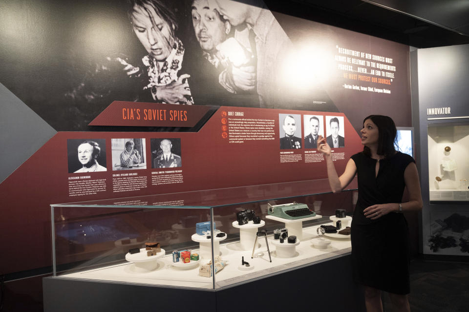 Deputy Director for the Museum in the Central Intelligence Agency Janelle Neises talks about the CIA's Soviet spies exhibit in the refurbished museum in the CIA headquarters building in Langley, Va., Saturday, Sept. 24, 2022. (AP Photo/Kevin Wolf)