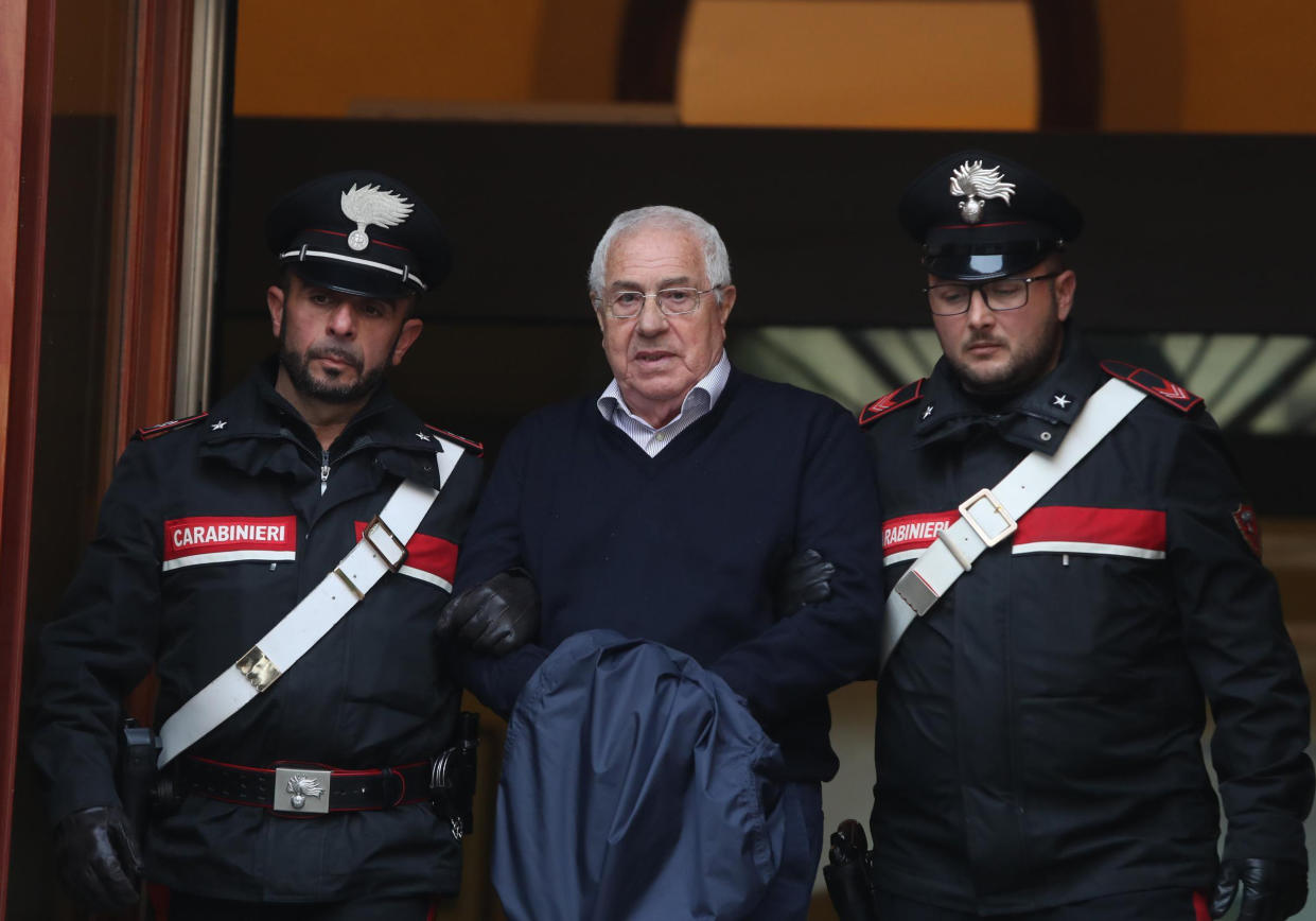 Settimo Mineo, centre, who allegedly took over as the Palermo head of Cosa Nostra, was arrested in Palermo, Sicily, on Tuesday (Picture: AP)