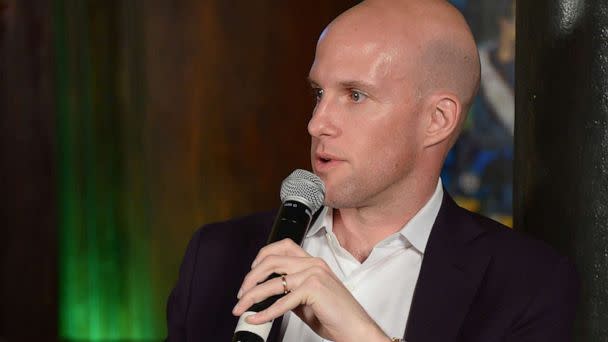 PHOTO: Sports reporter Grant Wahl speaks on a panel discussion in New York, April 8, 2014. (Michael Loccisano/Getty Images, FILE)