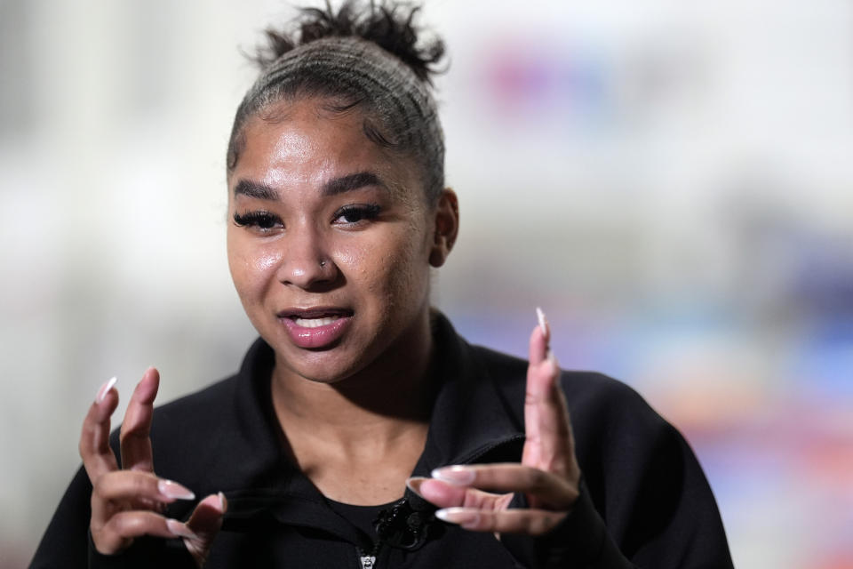 Gymnast Jordan Chiles answers a question during an interview Thursday, Feb. 29, 2024, in Spring, Texas. (AP Photo/David J. Phillip)