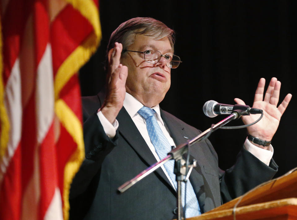 Lt. Col. Hugh F. Foster III gestures as he talks about the role his father played with the Comanche Code Talkers at a ceremony to honor the code talkers in Lawton, Okla, Thursday, Sept. 26, 2013. Foster Jr. was tasked with helping the code talkers create their secret code. (AP Photo/Sue Ogrocki)