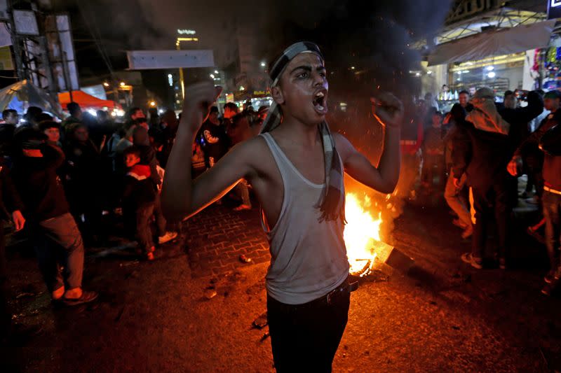 A Palestinian demonstrator reacts during a protest against the U.S. President Donald Trump's Mideast peace plan, in the southern Gaza Strip