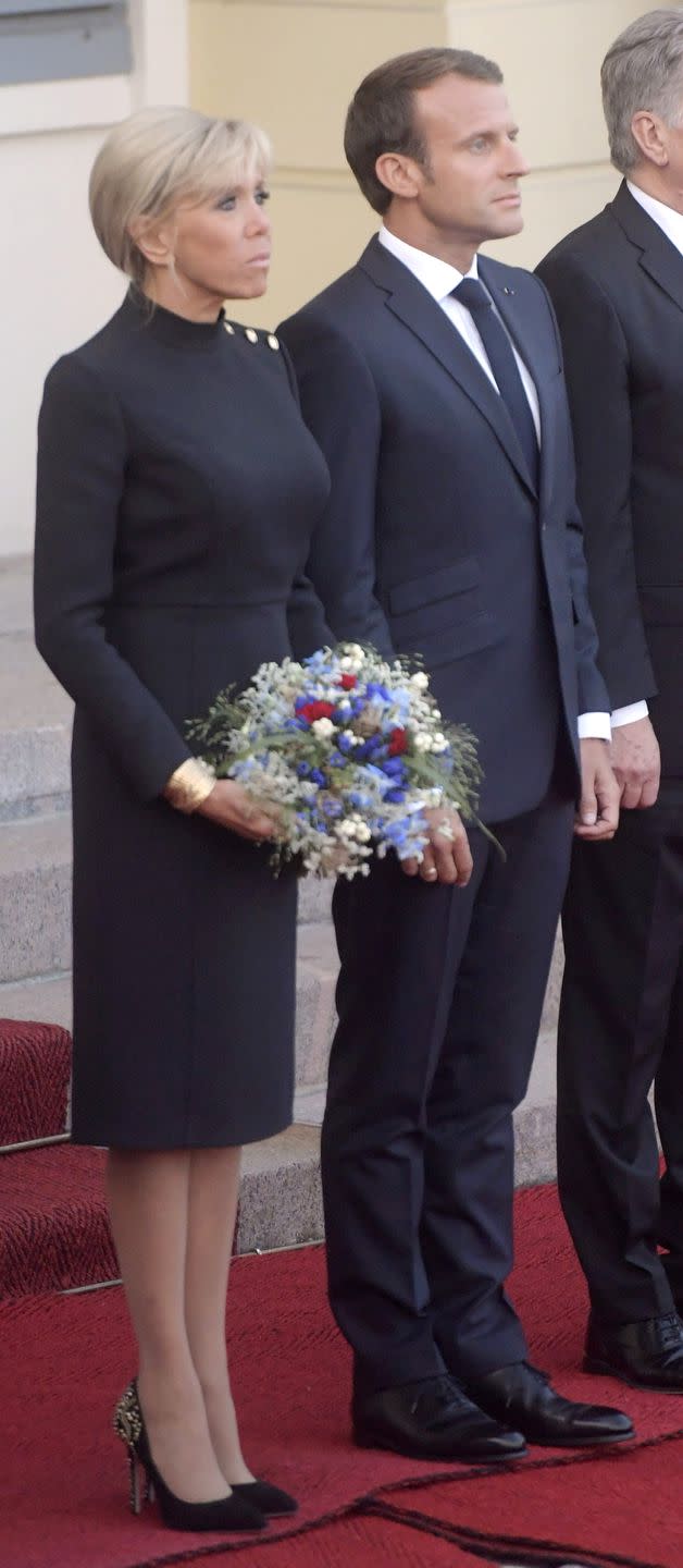 <p>Wearing a long-sleeve black shift dress with button details and black embellished pumps for a welcoming ceremony at the Presidential Palace in Helsinki, Finland. </p>