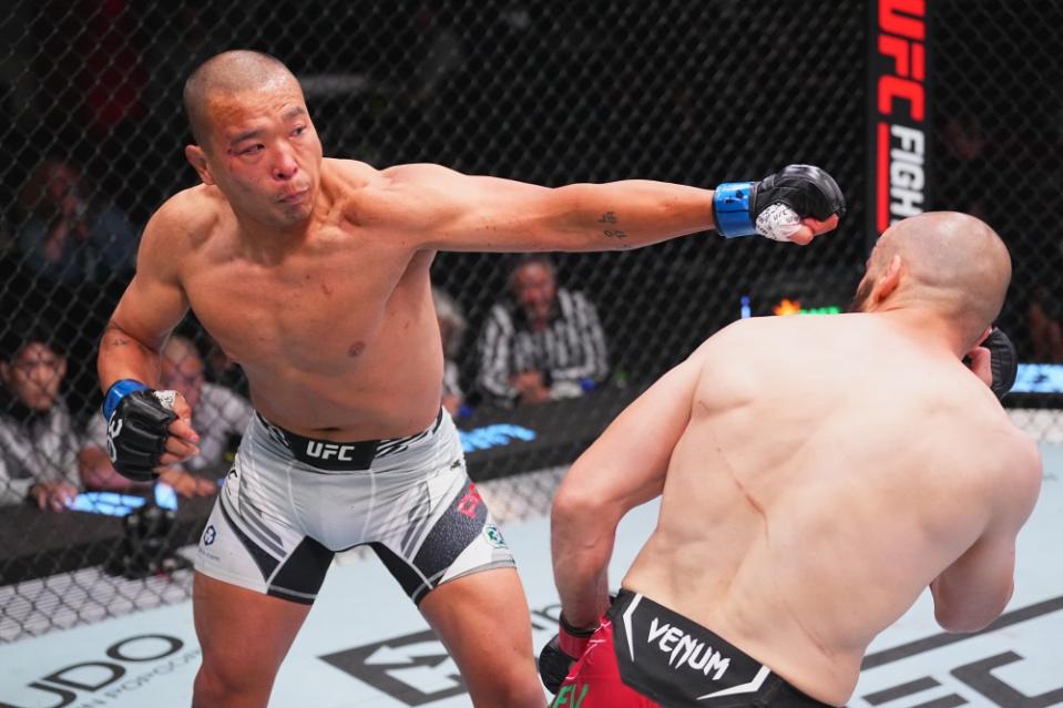 LAS VEGAS, NEVADA – JULY 15: (L-R) JunYong Park of South Korea punches Albert Duraev of Russia in their middleweight fight during the UFC Fight Night at UFC APEX on July 15, 2023 in Las Vegas, Nevada. (Photo by Jeff Bottari/Zuffa LLC via Getty Images)