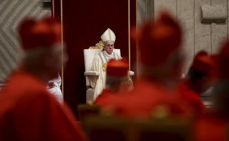 Pope Francis leads the First Vespers and Te Deum prayers in Saint Peter's Basilica at the Vatican December 31, 2015. REUTERS/Max Rossi