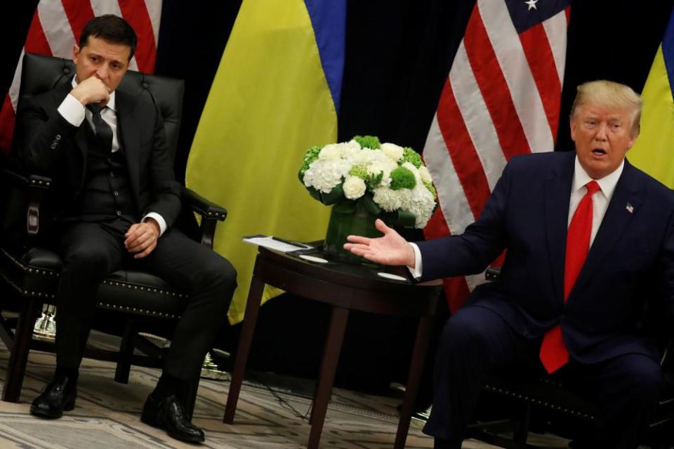 Volodymyr Zelenskiy listens as Donald Trump speaks, at the UN in September.